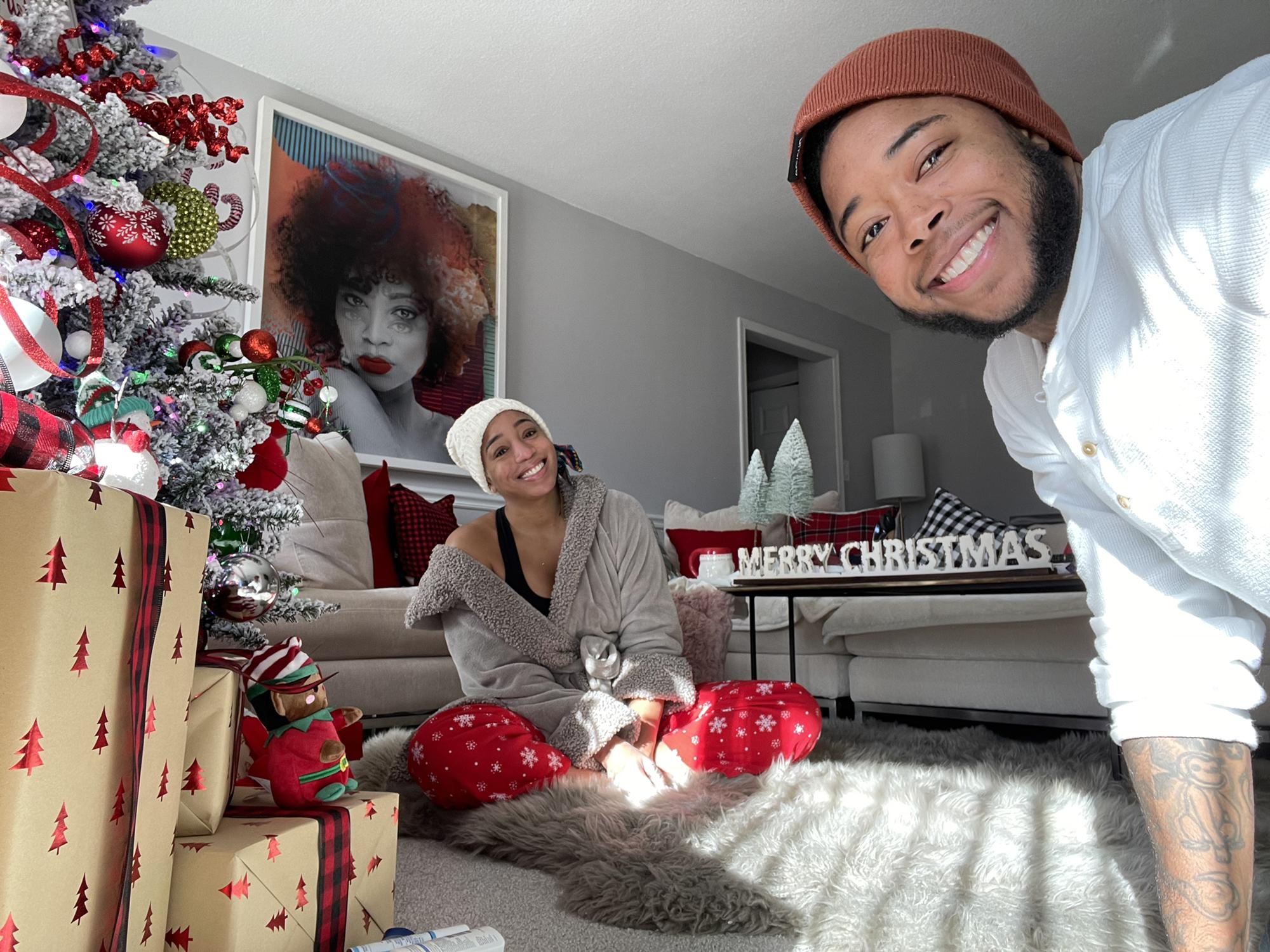 Christmas Morning 2021 - You may not be able to tell in this picture, but we OVERDO decorations. I love that we match holiday energy. Cheers to many years of decking the halls!