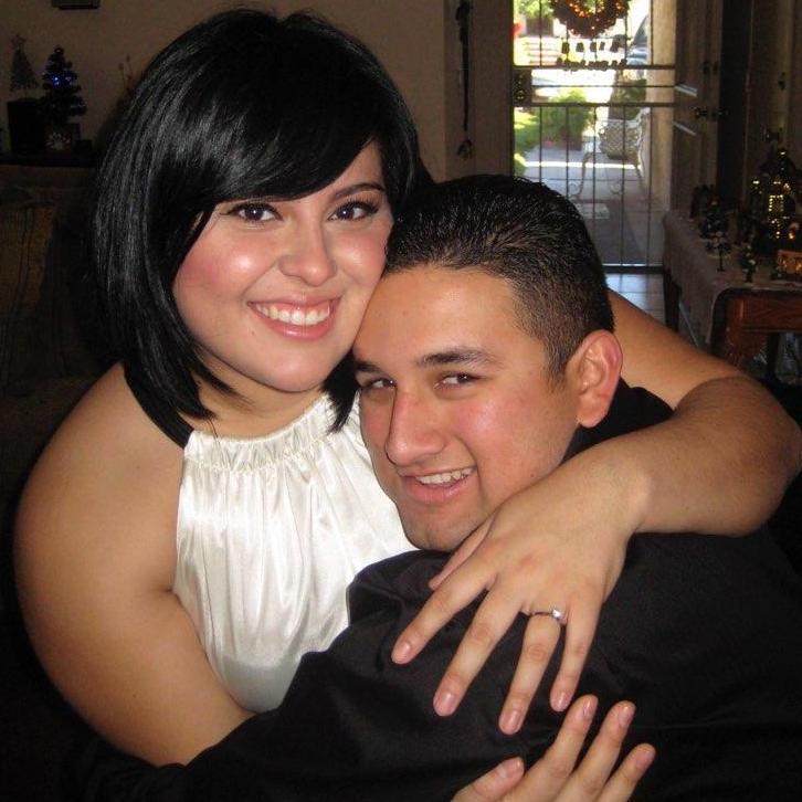 We got hitched through our civil ceremony on December 23, 2009 with just our parents and siblings! My sister took this photo of us.