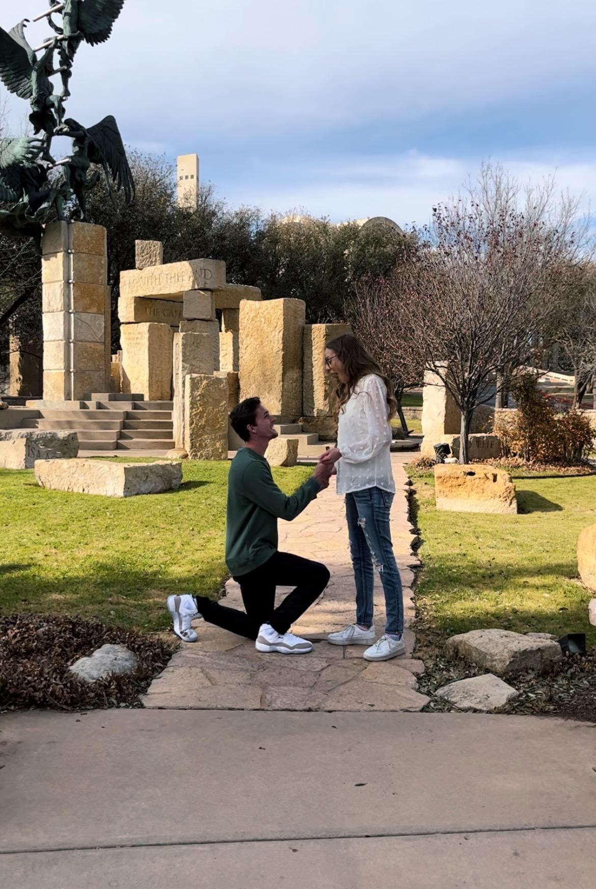 Blake proposed in front of a beautiful statue, "Jacob's Dream", on the ACU campus