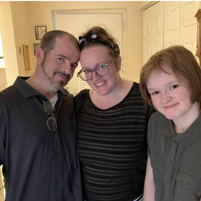 Our first family photo. This photo was taken in my grandma's apartment during a family visit. We love this photo, and the promise of family that it represents.
