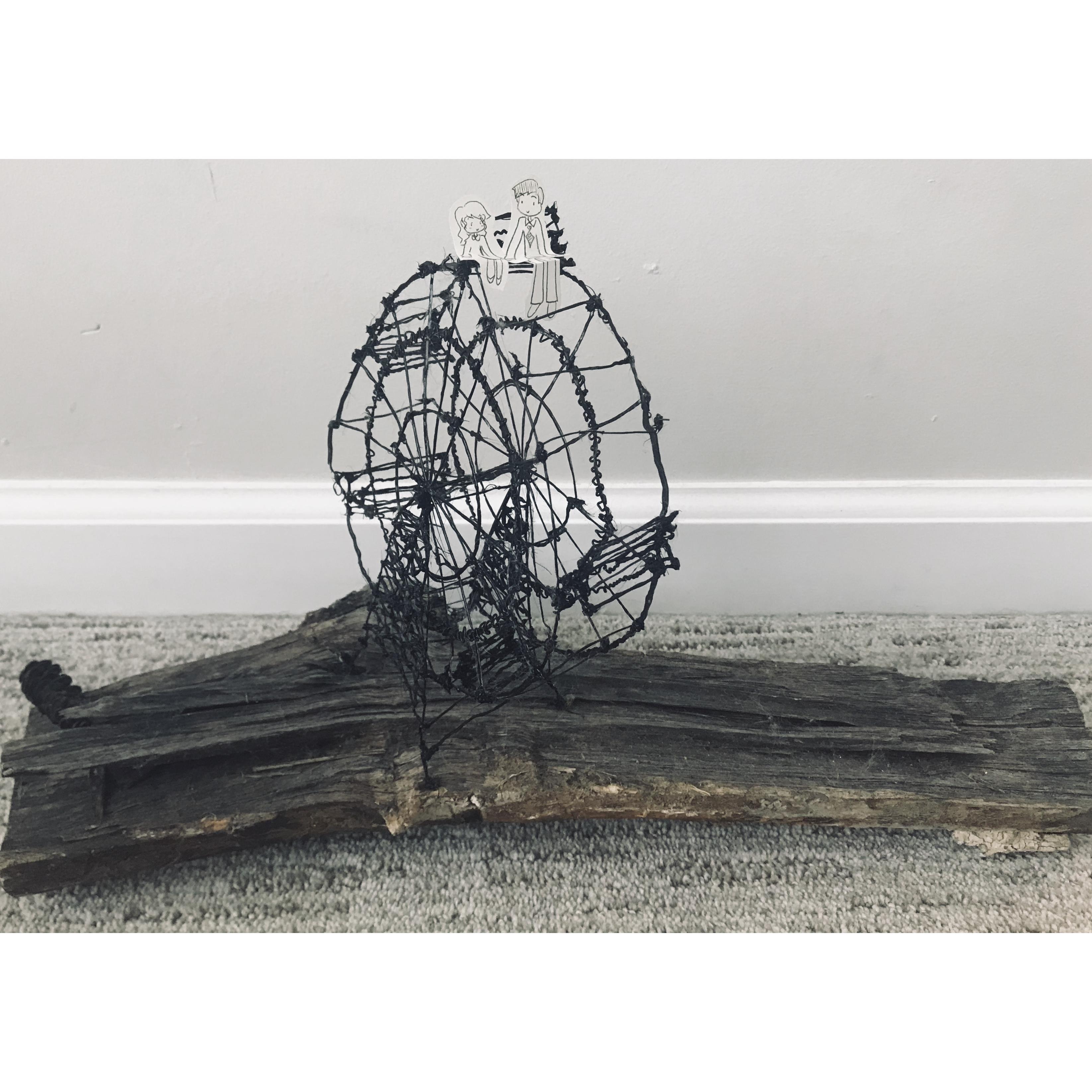 Anniversary present from her to him: self-made 3-D pen Ferris wheel sculpture with the two of them at the top