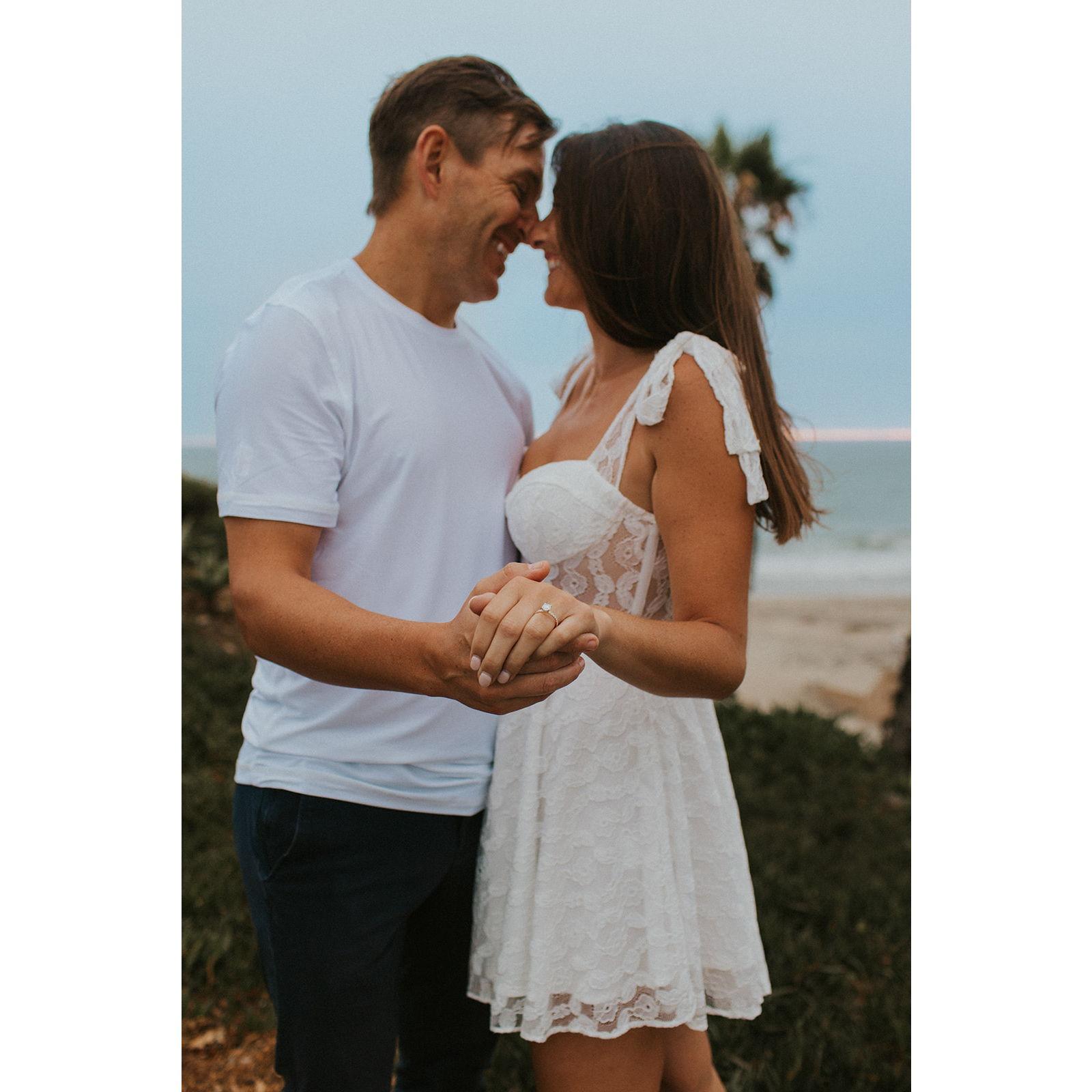 Showing off the ring and haircut!
