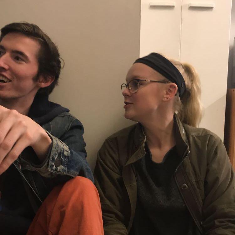 The first photo ever of us together, taken on the kitchen floor of an apartment in College Park during our very first date (November, 2018).