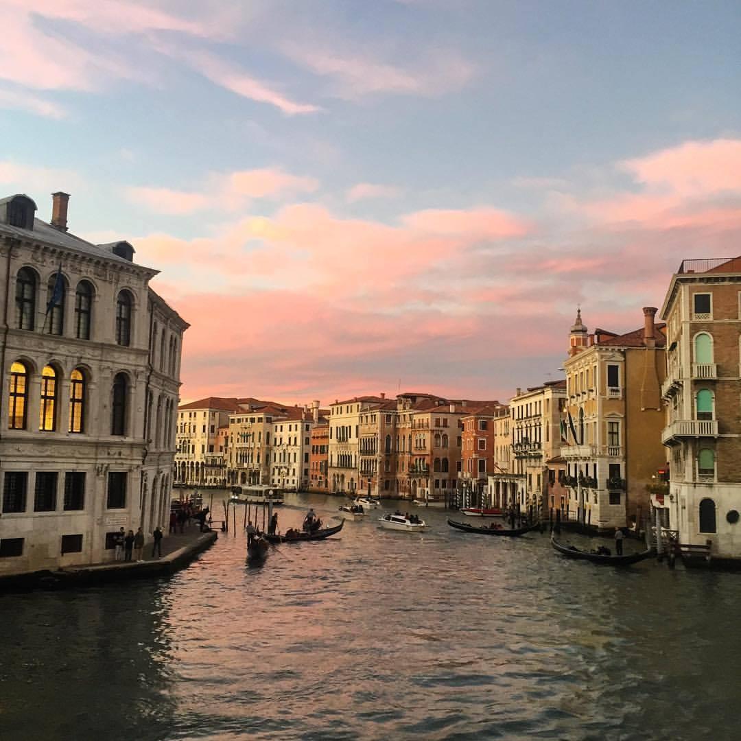 Sunset view from the Rialto Bridge in Venice.