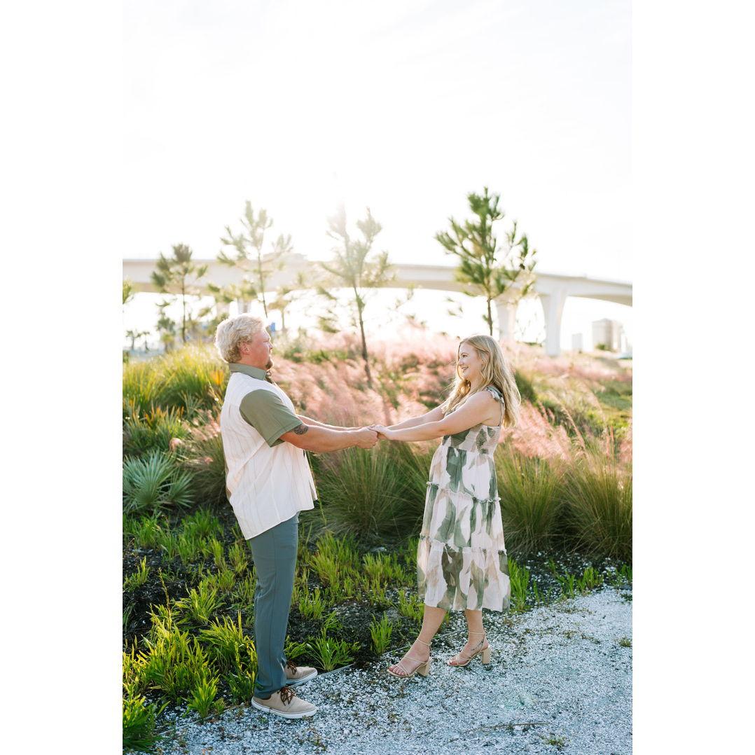 Engagement photos at the proposal spot.