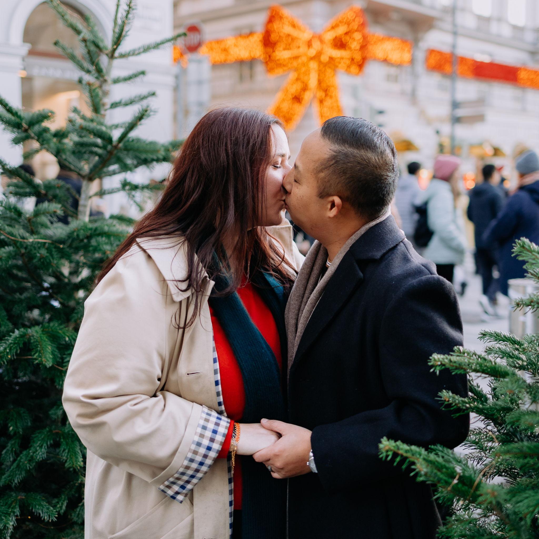 Engagement photo taken near the famous red bow in Vienna - November, 2025