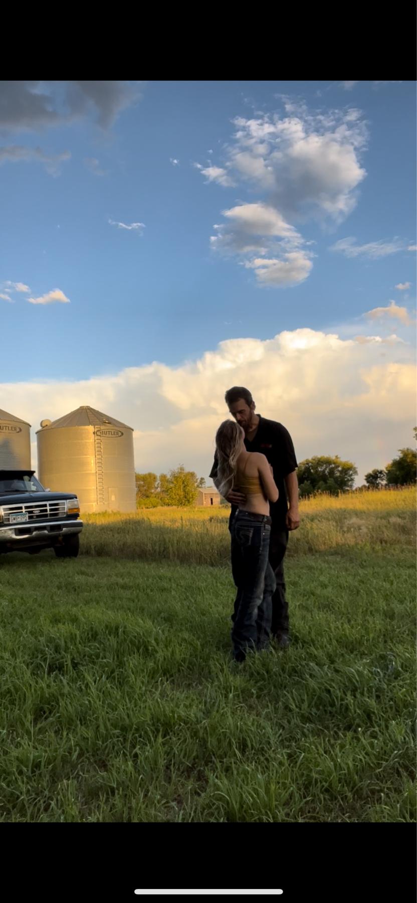 Chris and I enjoying the day out on the Rocky acres farm while living out there in the camper.