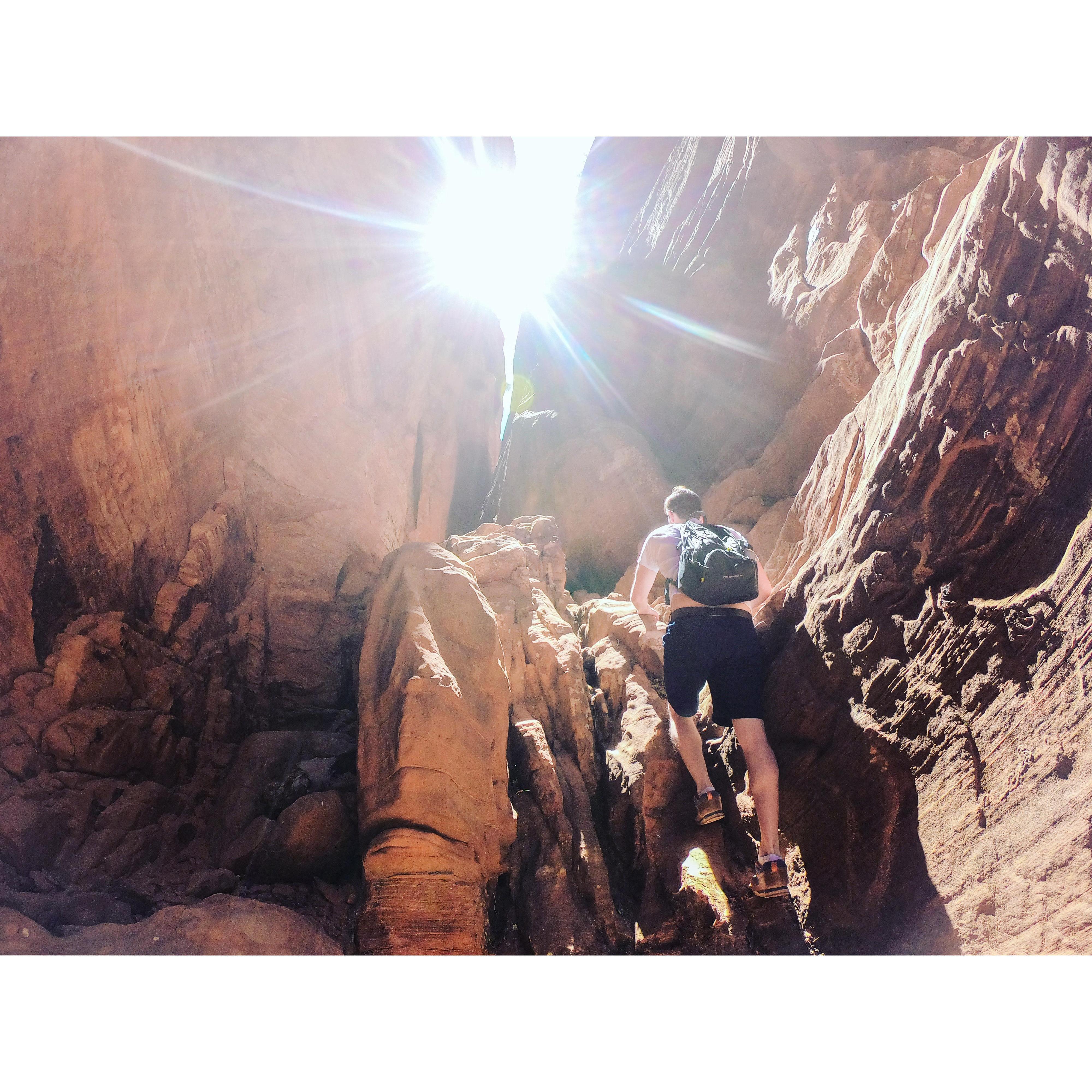 Jeff climbing into the slot canyon where he proposed!