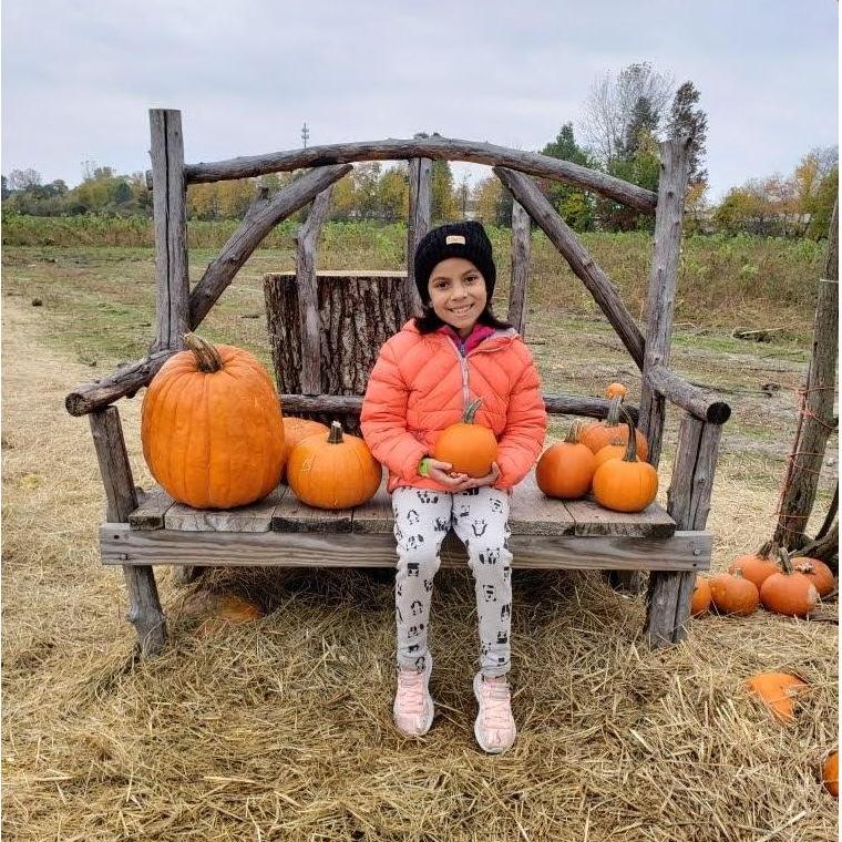 Ellie at pumpkin patch 2019