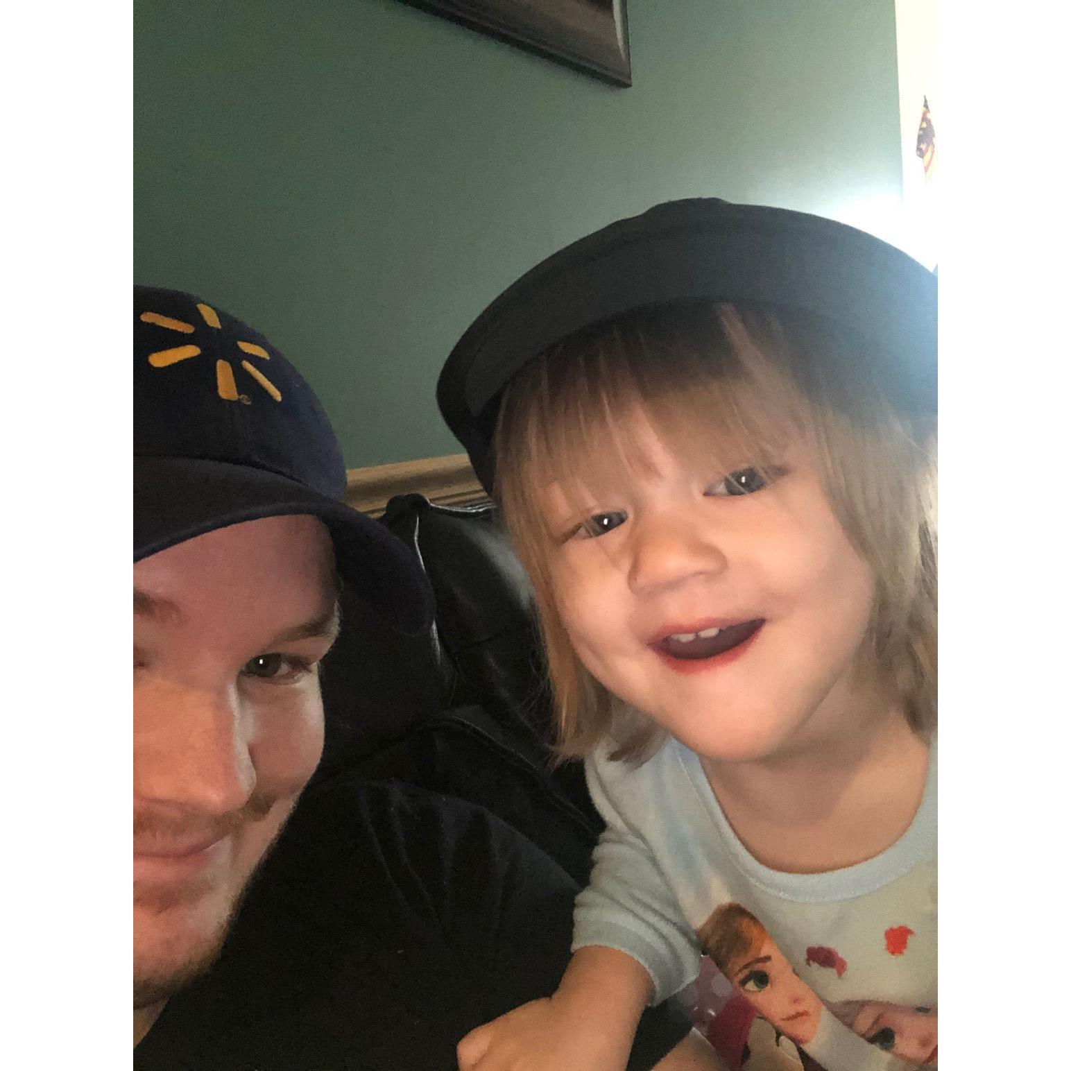 Zoey loves wearing dad's hats