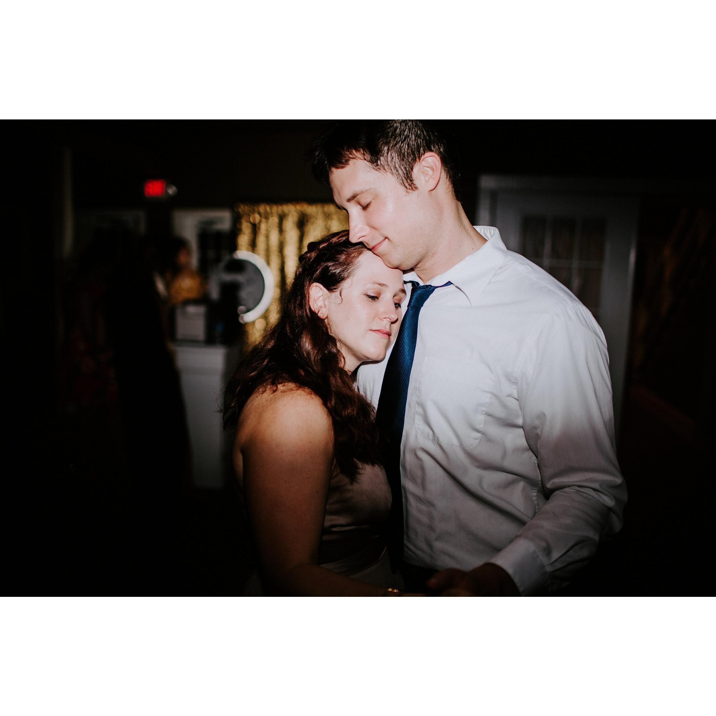 Dancing together at a friend's wedding.