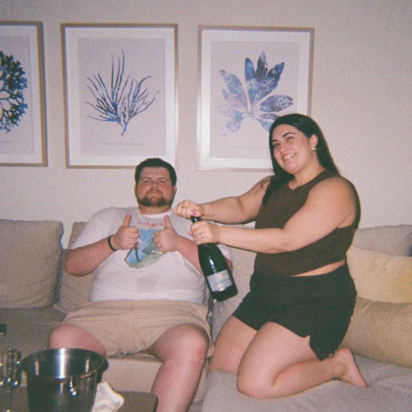 popping the champagne after saying YES!