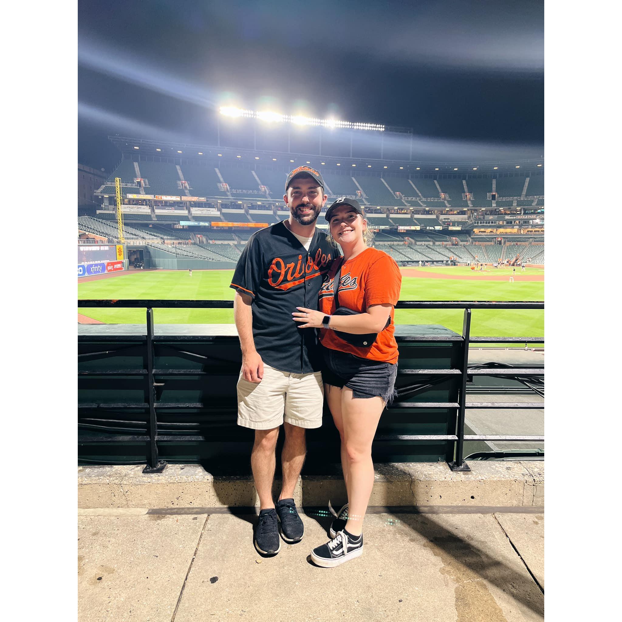 Our first photo at the Orioles game on our third date!