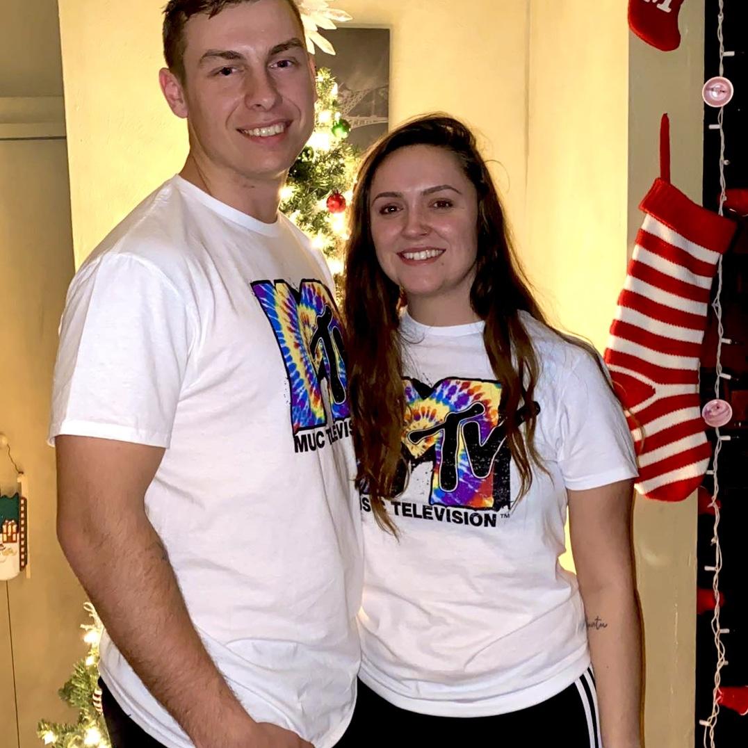 Our first Christmas together. It was supposed to be matching PJs, but MTV shirts work too.