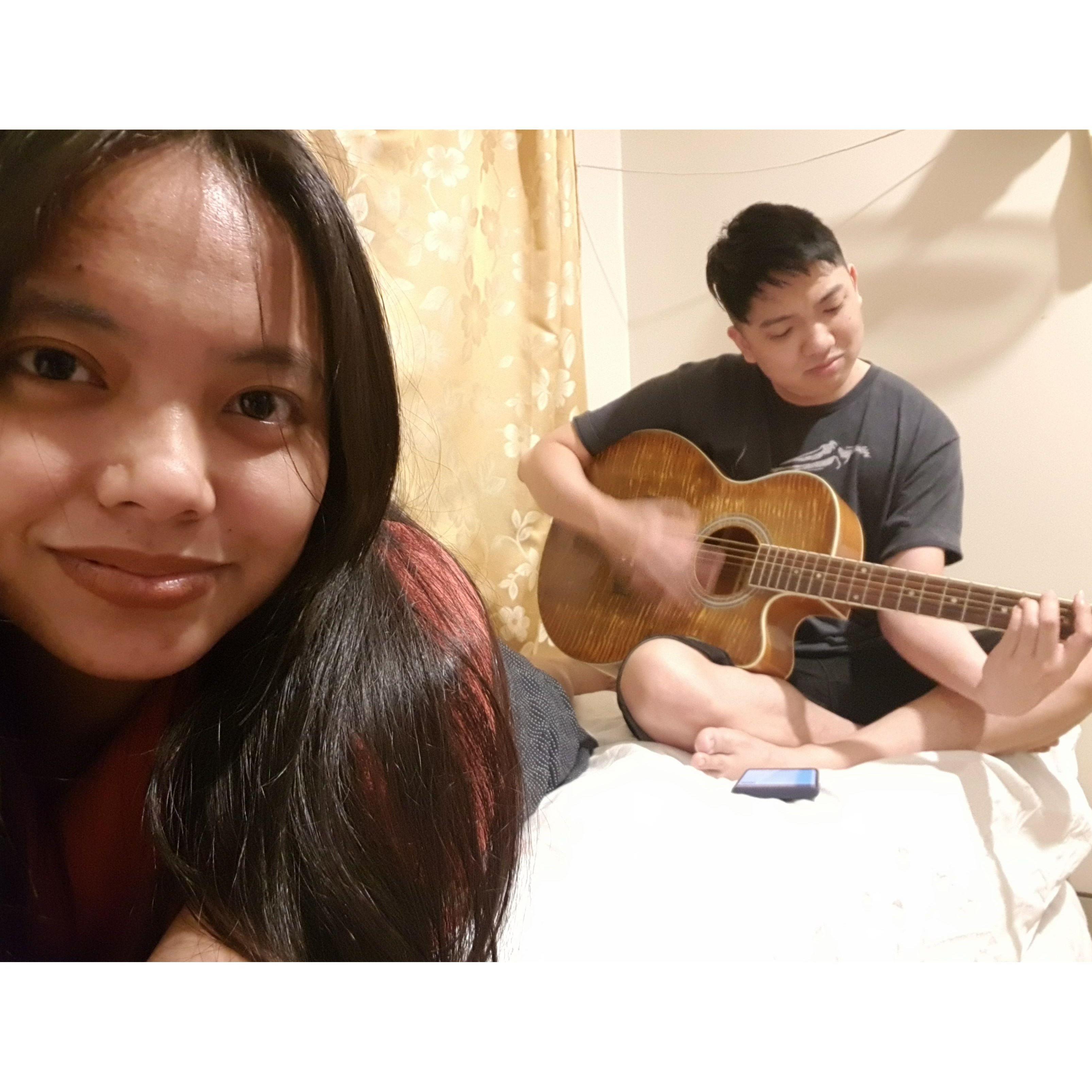 He loves playing the guitar and covering songs for her