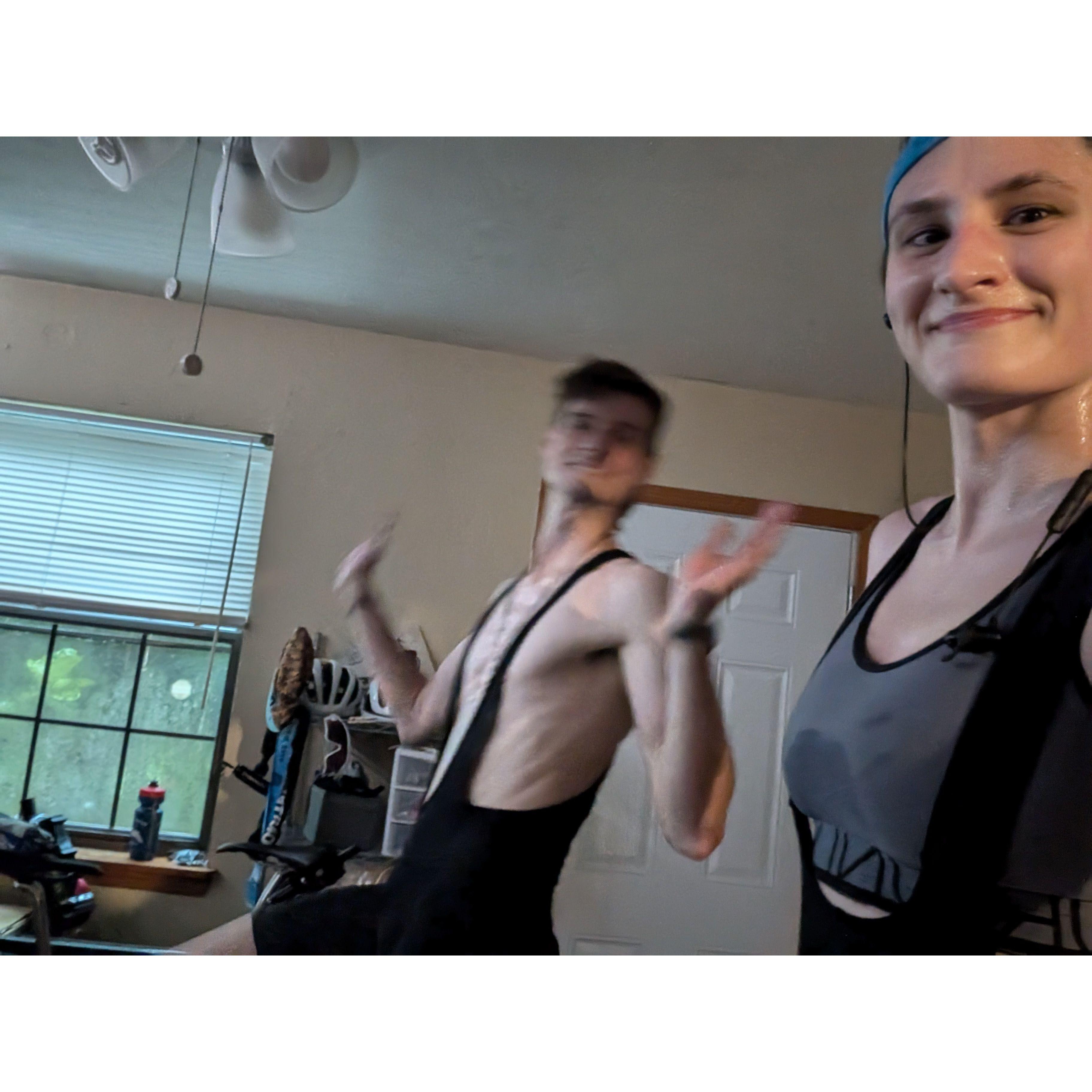 Waiting out bad weather by riding the trainer together indoors! No matter what, we make it fun. 2024.