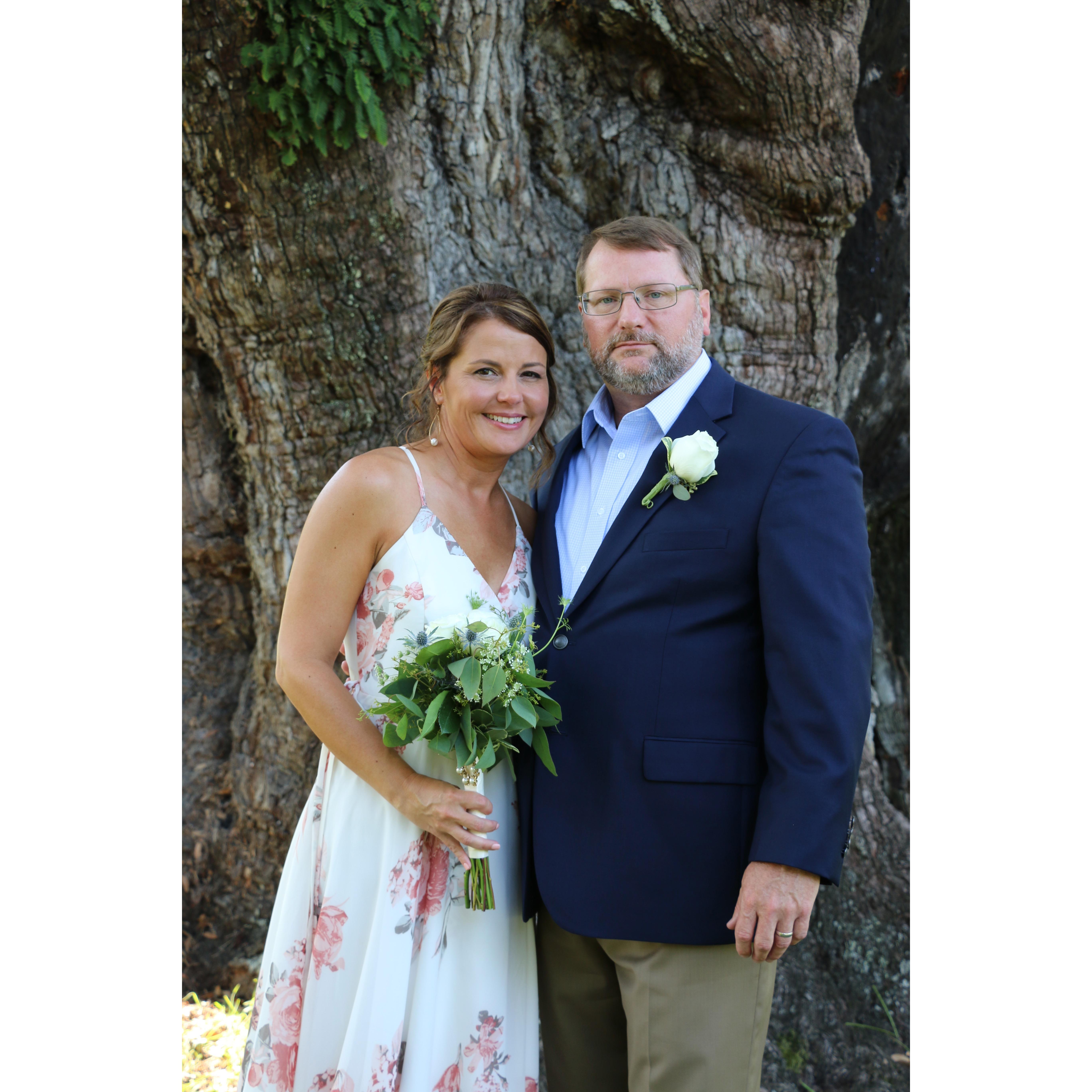 We said. " I do" under a 816 year tree in City Park.