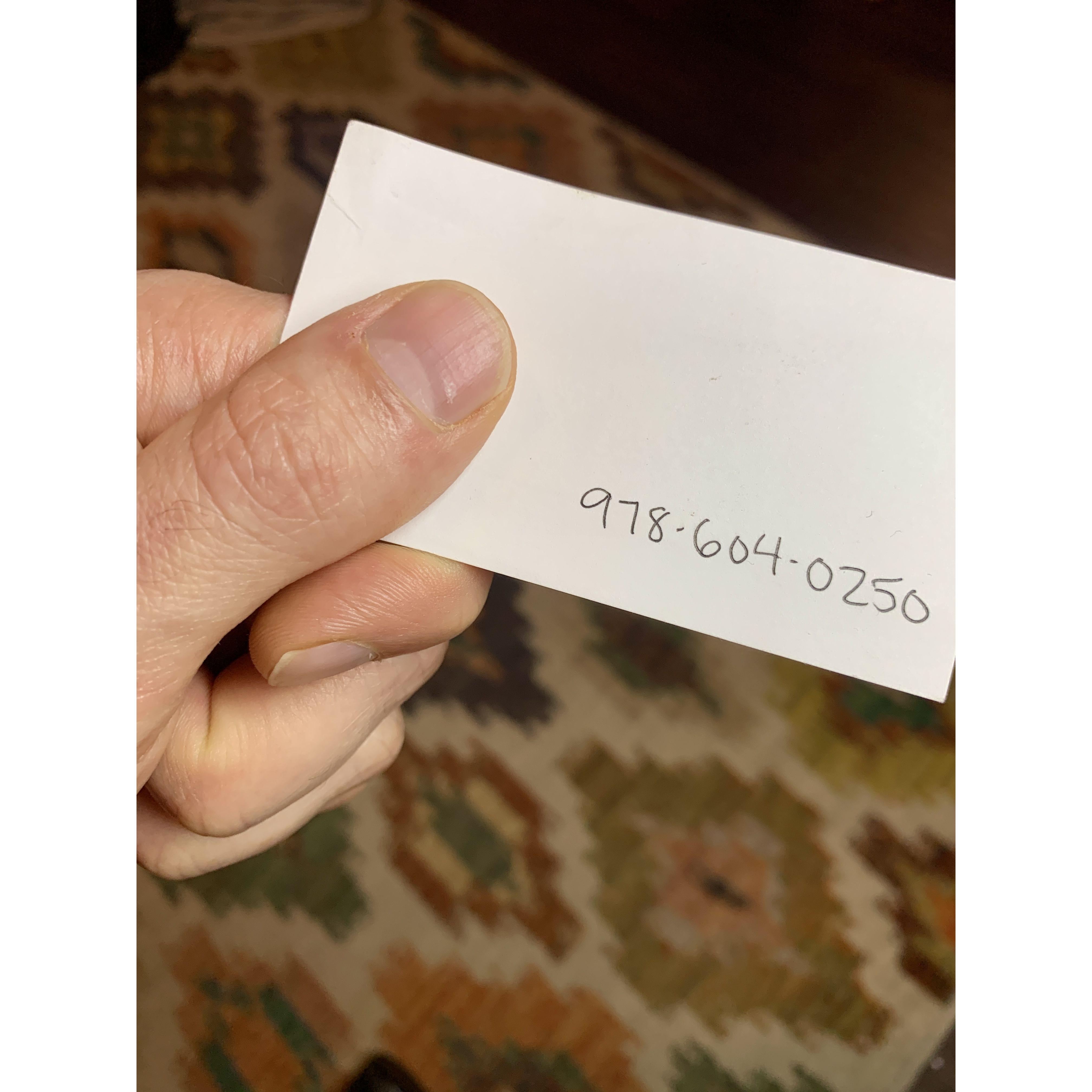 When Riley left, he asked Leah for her number. She pulled a card out of her back pocket and handed it to him - she had already written down her number and was waiting for him to ask.