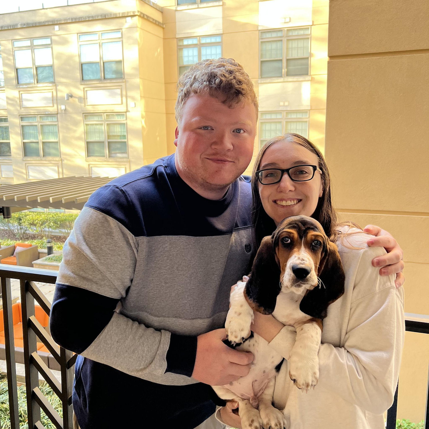 Our first photo as a family of three with our Basset Hound, Hank!