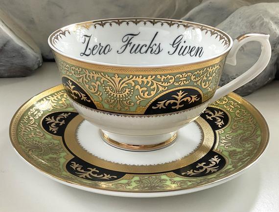 Green, Black and Gold “Zero Fucks Given" Teacup and Saucer Set (8 oz), Dishwasher- and Foodsafe. Customizable.