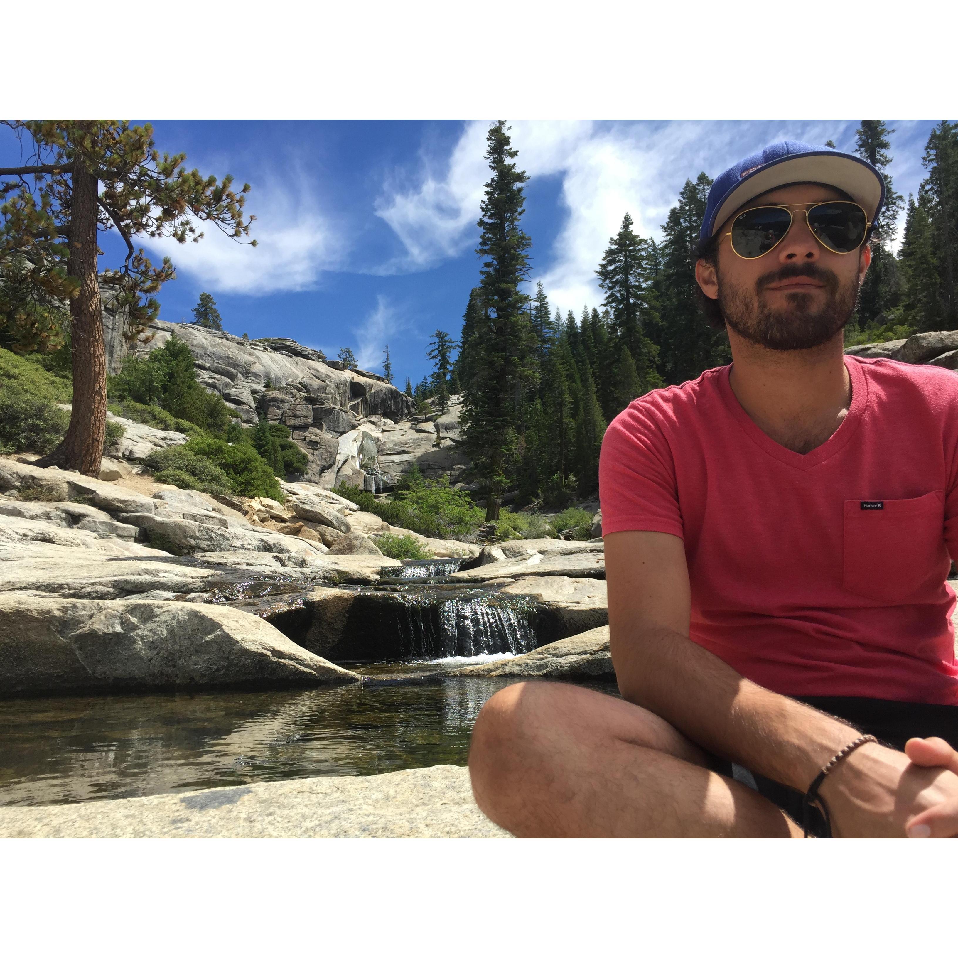 Tony taking in the endless view at the top of a B-Dults day hike in Yosemite