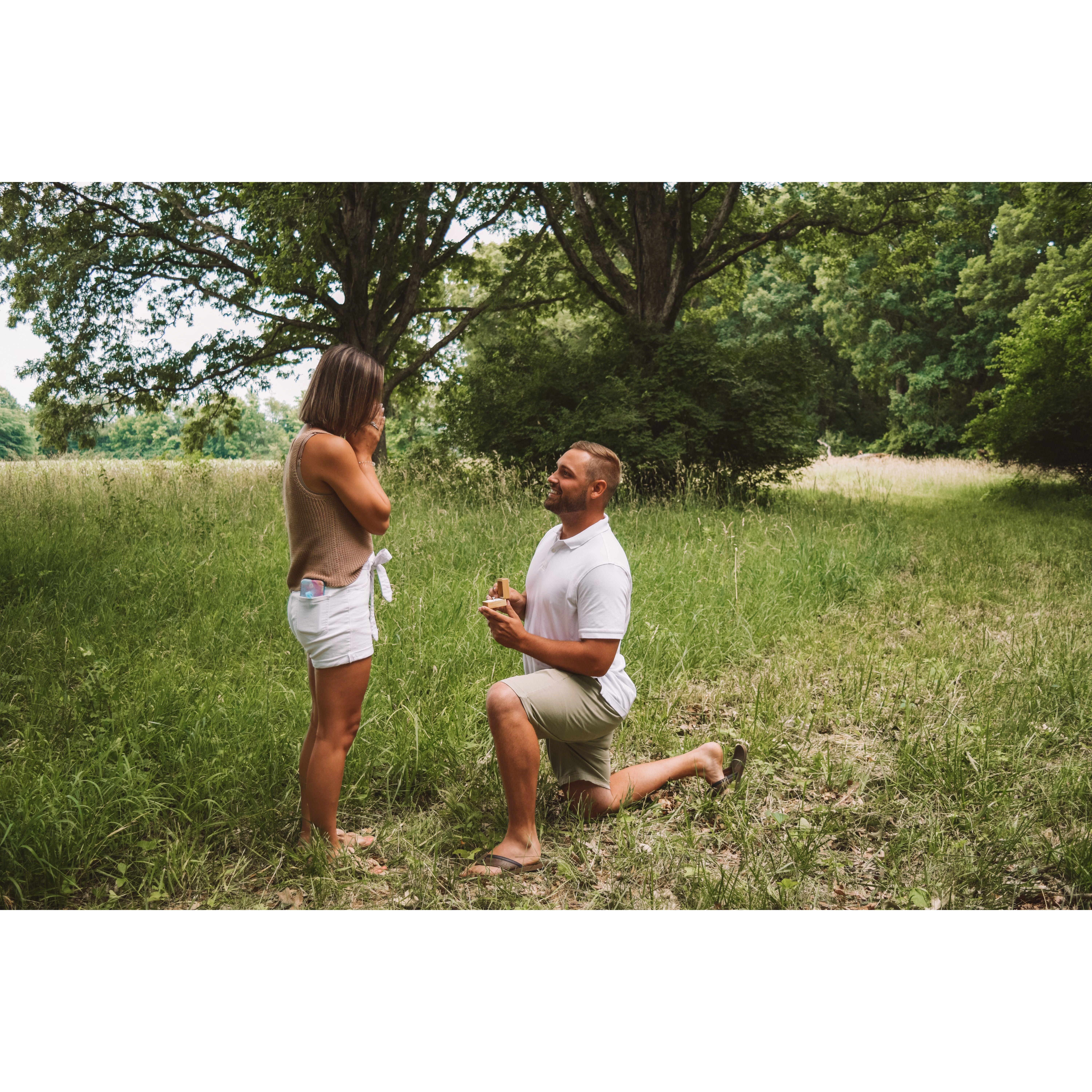 Parker got down on one knee during our family pictures on June 25th, 2022.