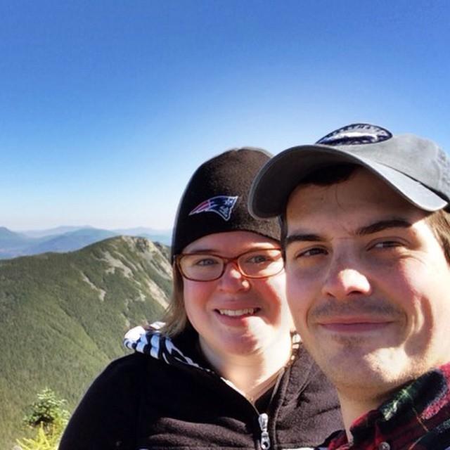 Standing at the summit of Mt. Liberty in the New Hampshire mountains.