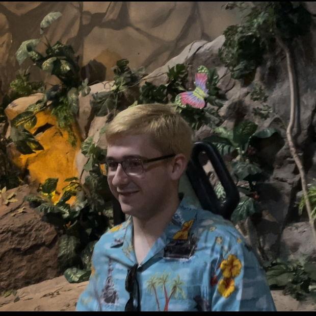 Cameron on his 23rd Birthday riding the Rainforest Cafe water ride in Galveston Texas, June 25, 2023