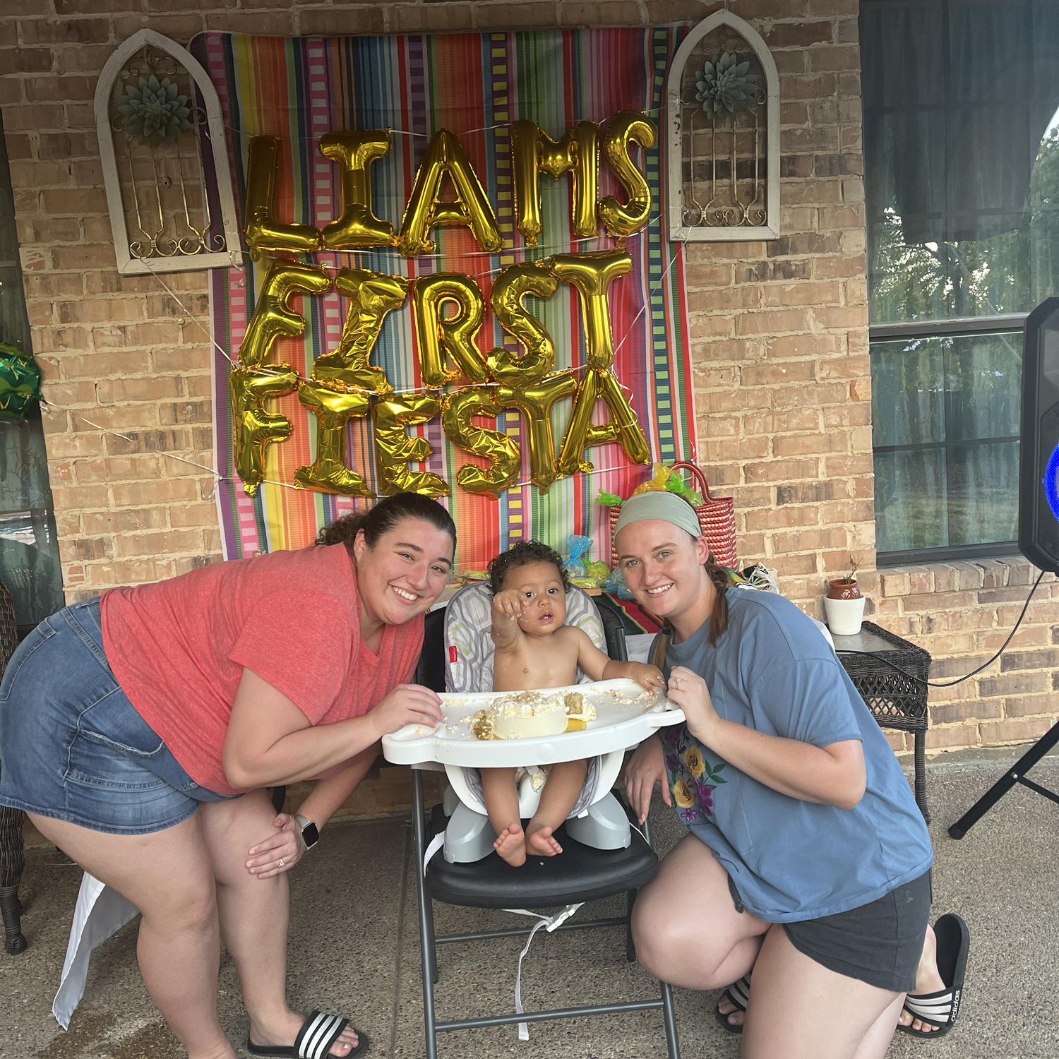 Kara and Bailey with their ring bearer in 2023