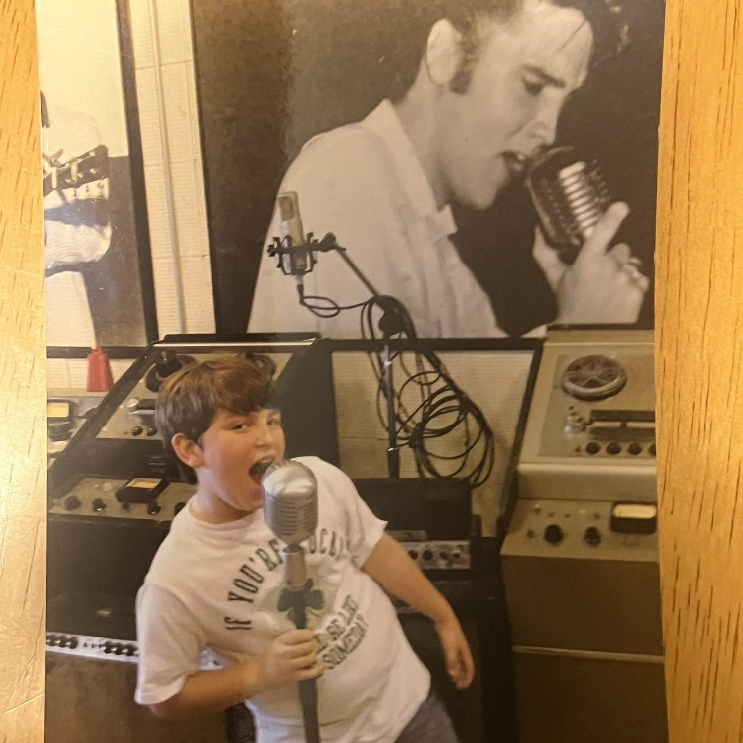 Bryanna is a huge Elvis fan! She knew it was meant to be when she came across this picture of young Clayton in front of an Elvis poster haha.
