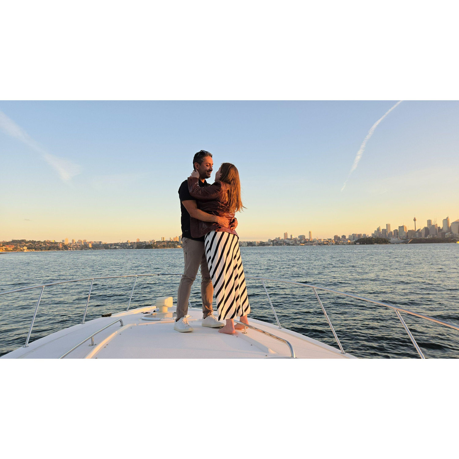 Sunset, a boat, charcuterie, champagne, the Sydney Opera House, the Harbor Bridge, and a proposal: does it get any better than that?