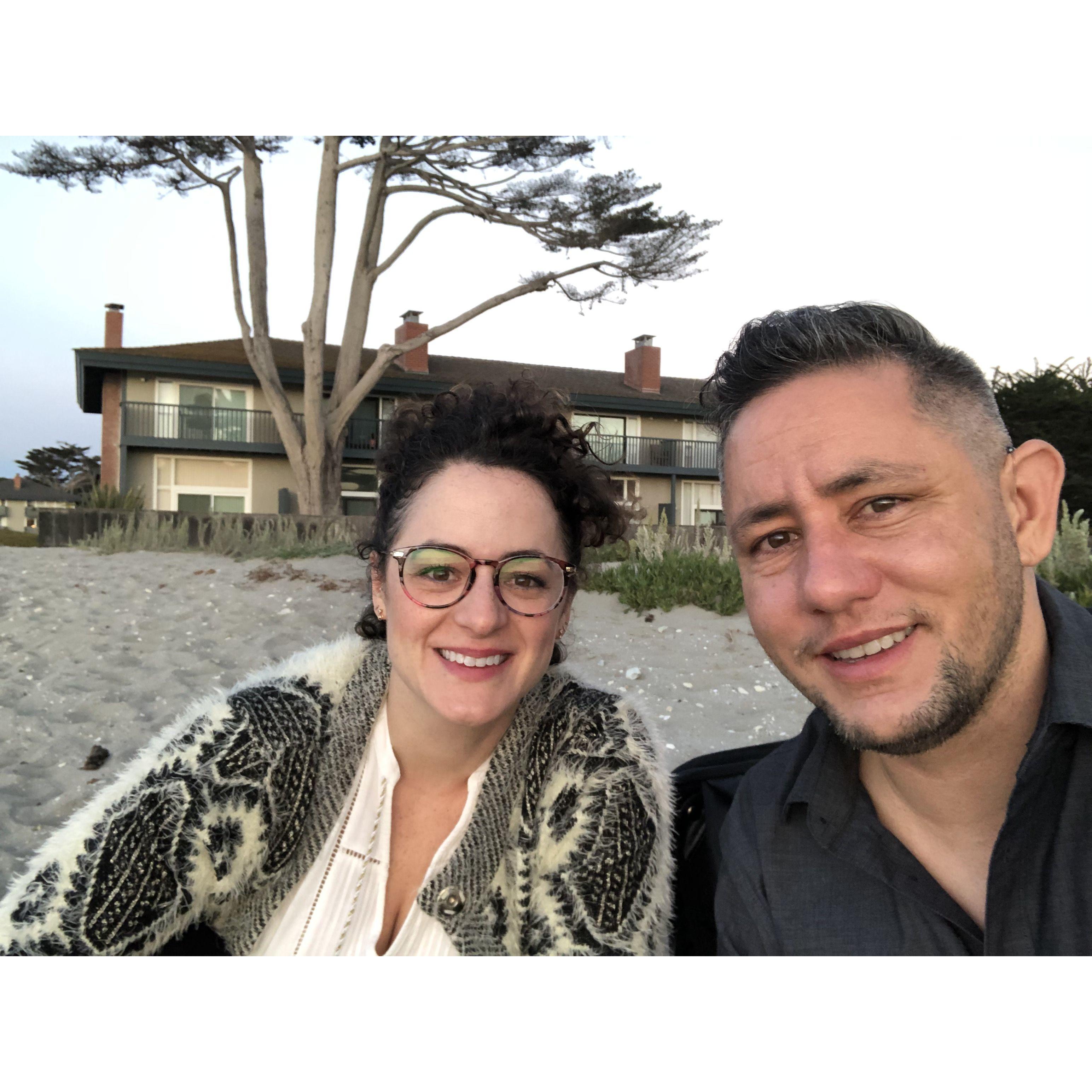 At Carmel beach. At the time we didn't know we'd be getting married here. Now we get to return with all of you, our community, to make this official.