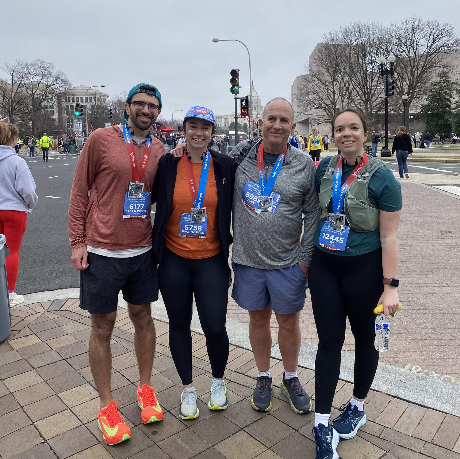 March 2025 - Rachel, Zack, Emily, and Rachel's Dad run the Rock n Roll half marathon. Little did Rachel know, Zack was about to propose