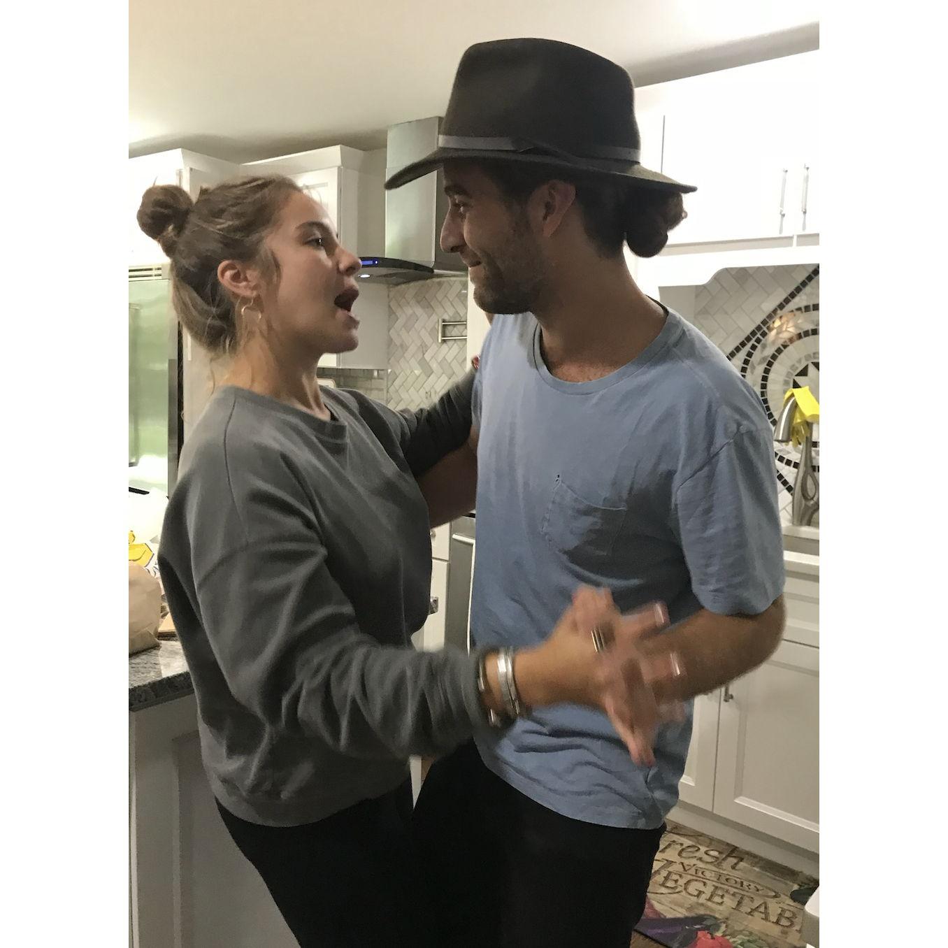 Teaching Clarke how to salsa in my parents kitchen on Long Island!