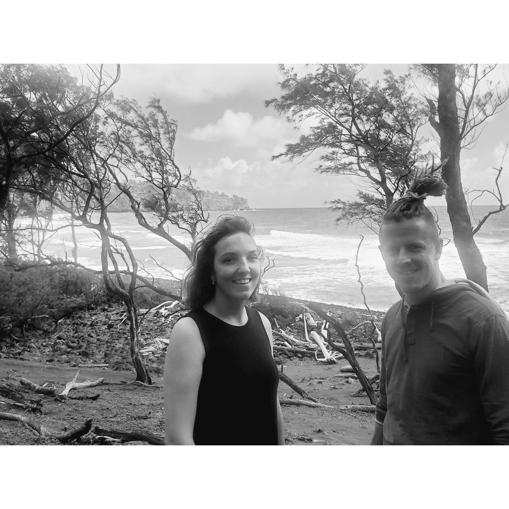 Reunited back in Hawaii one year later for a friend's wedding... oh now there's something happening, but neither are saying it! lol!