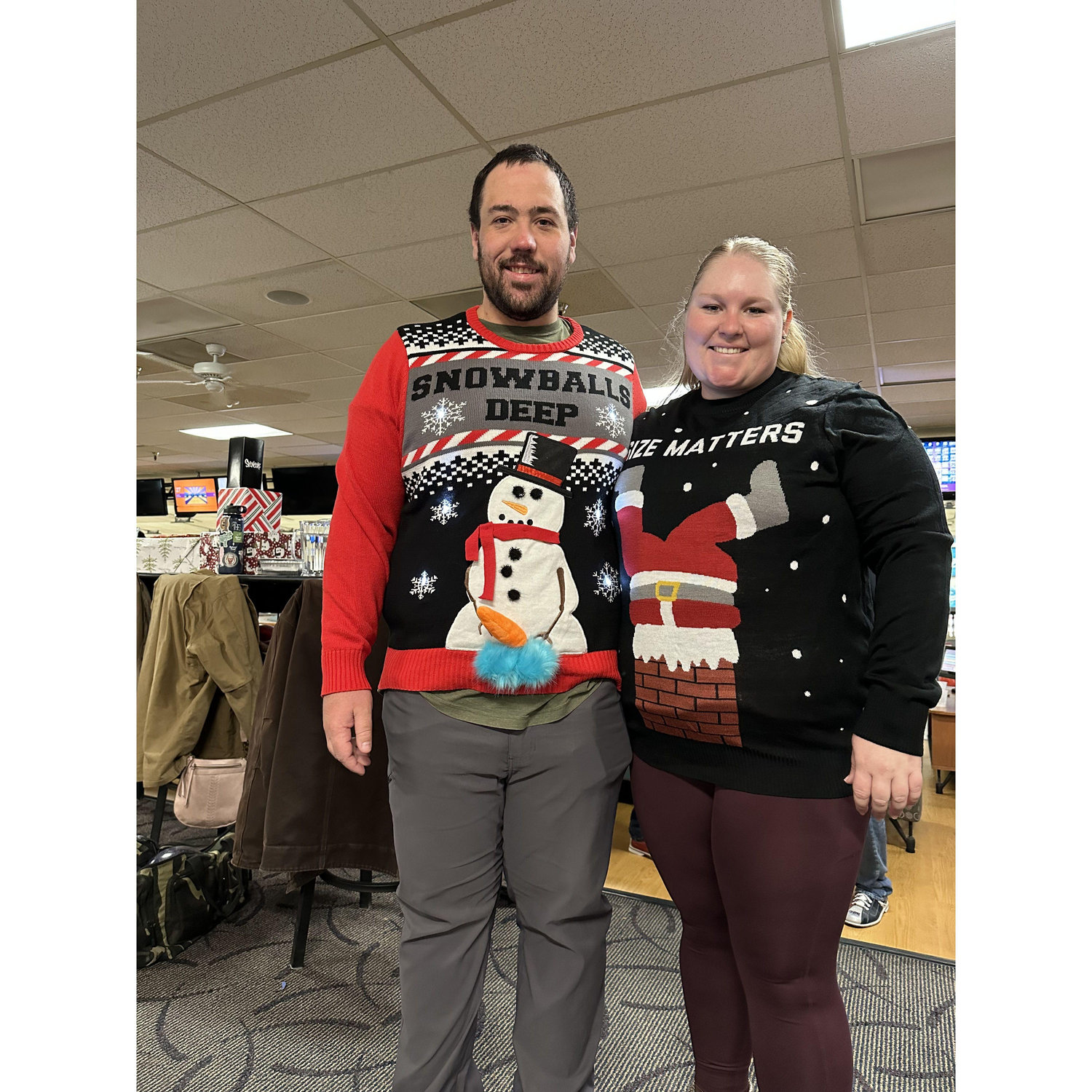 Our entries into the ugly sweater contest for Daniels work