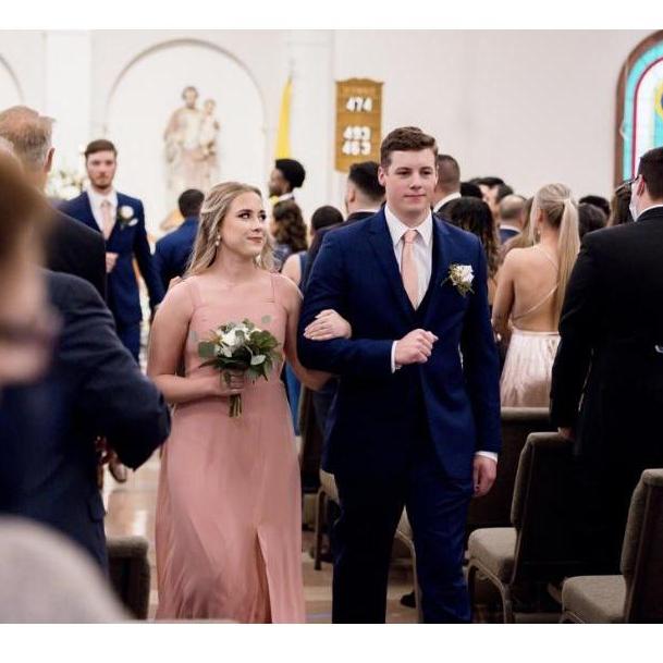 Watching their besties get married in April 2021 (shoutout Manny + Brenna!).
