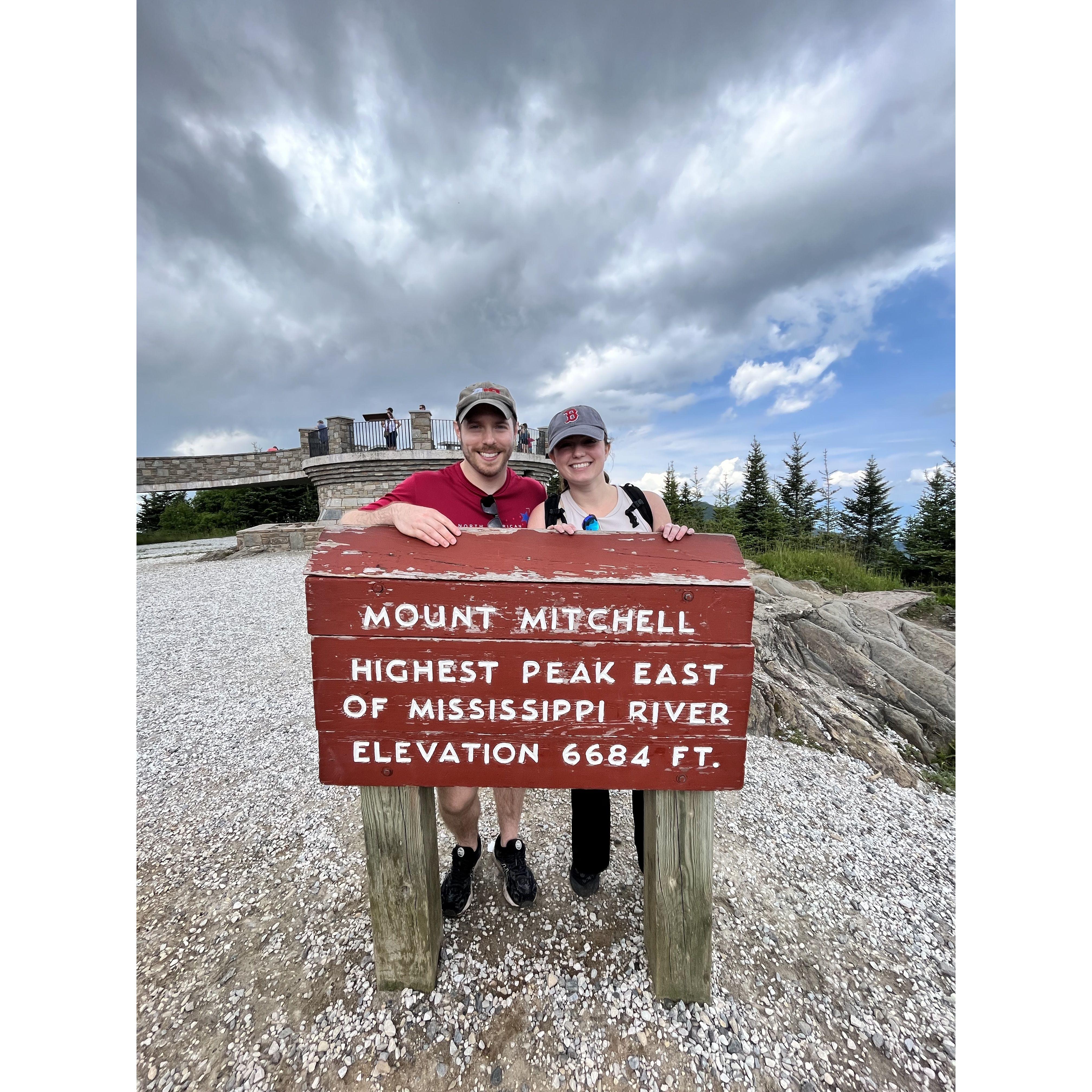 July 2023 - Hike up to Mount Mitchell, Logan protected Emily from a brief (but frightening) hailstorm