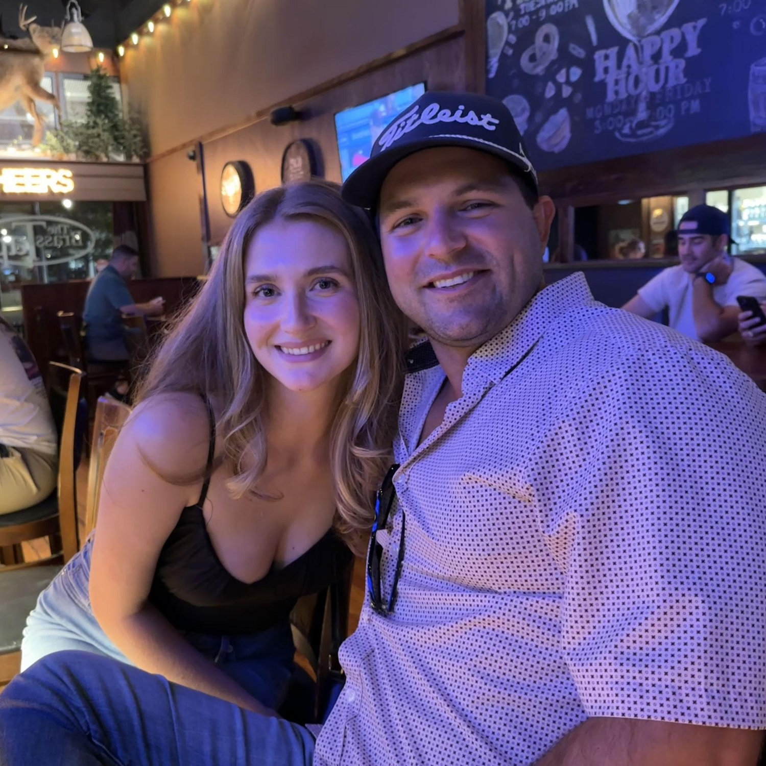 Picture of us on our first date. (Thank you to the drunk lady at the bar who insisted on this picture "in case we get married one day."