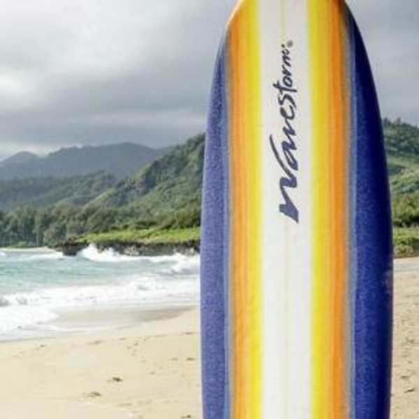 Couple's surfing lesson