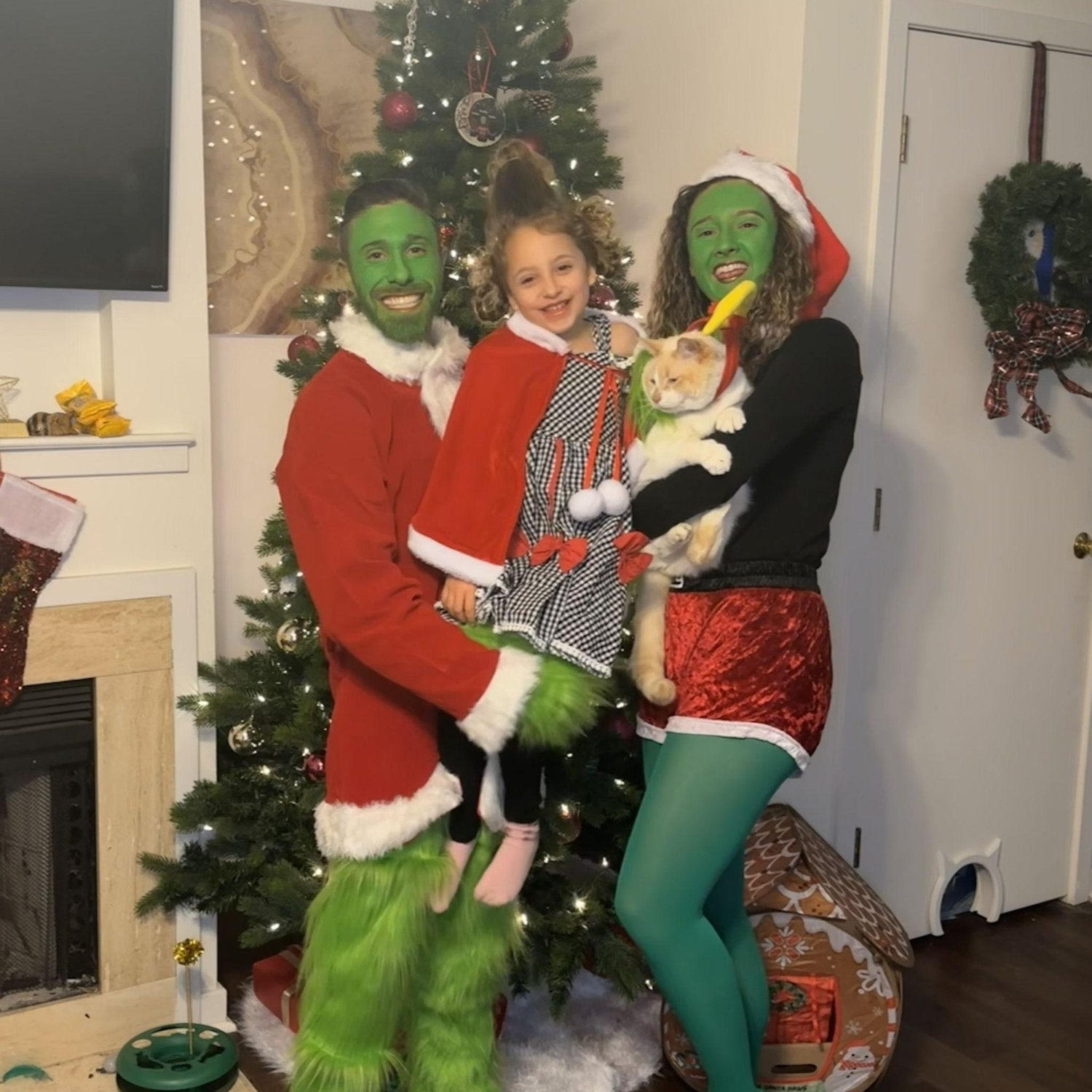 Attempts at a Christmas card (yes we did paint ourselves green and that is a waterbottle in Madelyn's hair)