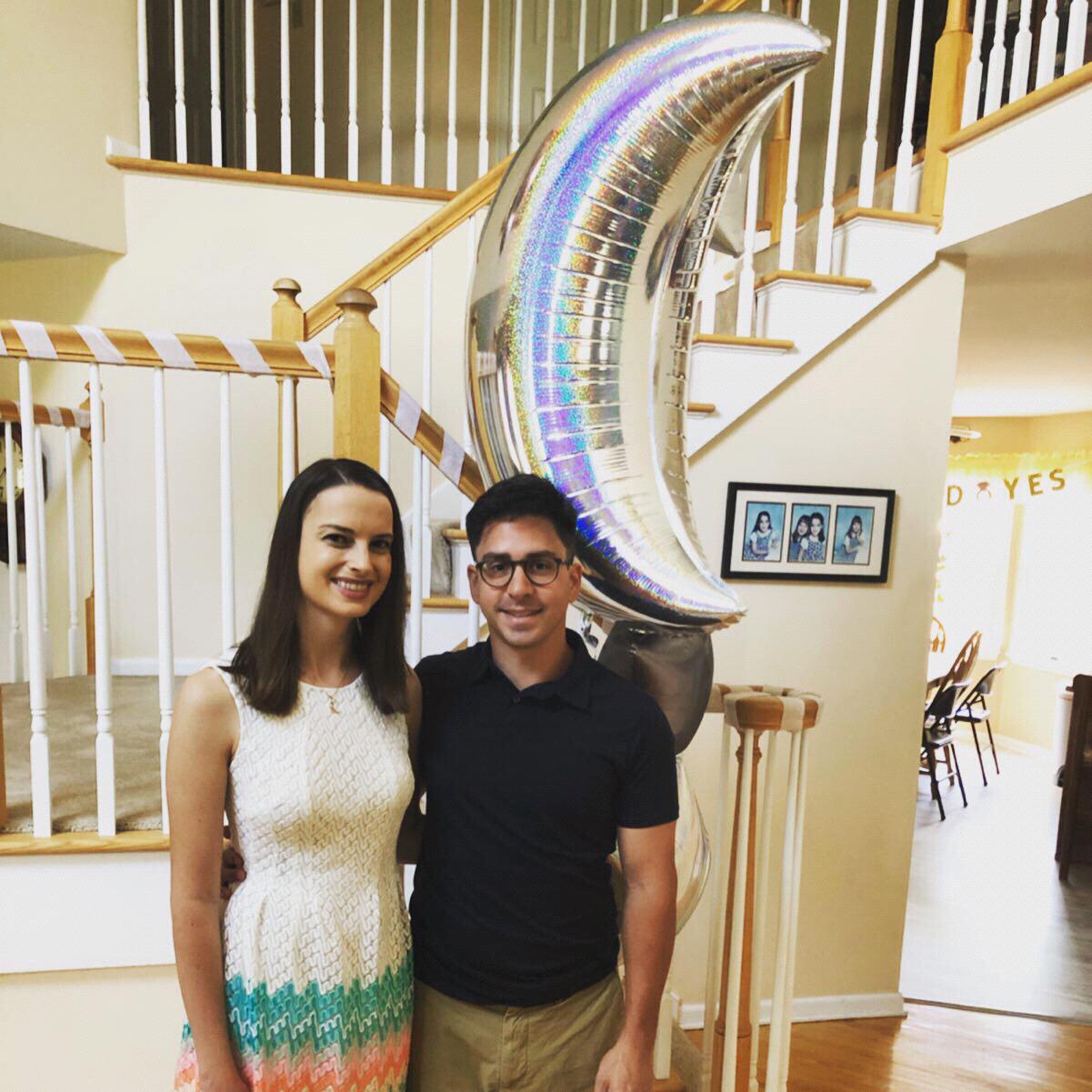 A photo from our engagement party celebration with our families. We’re over the moon and can’t wait for the big day!