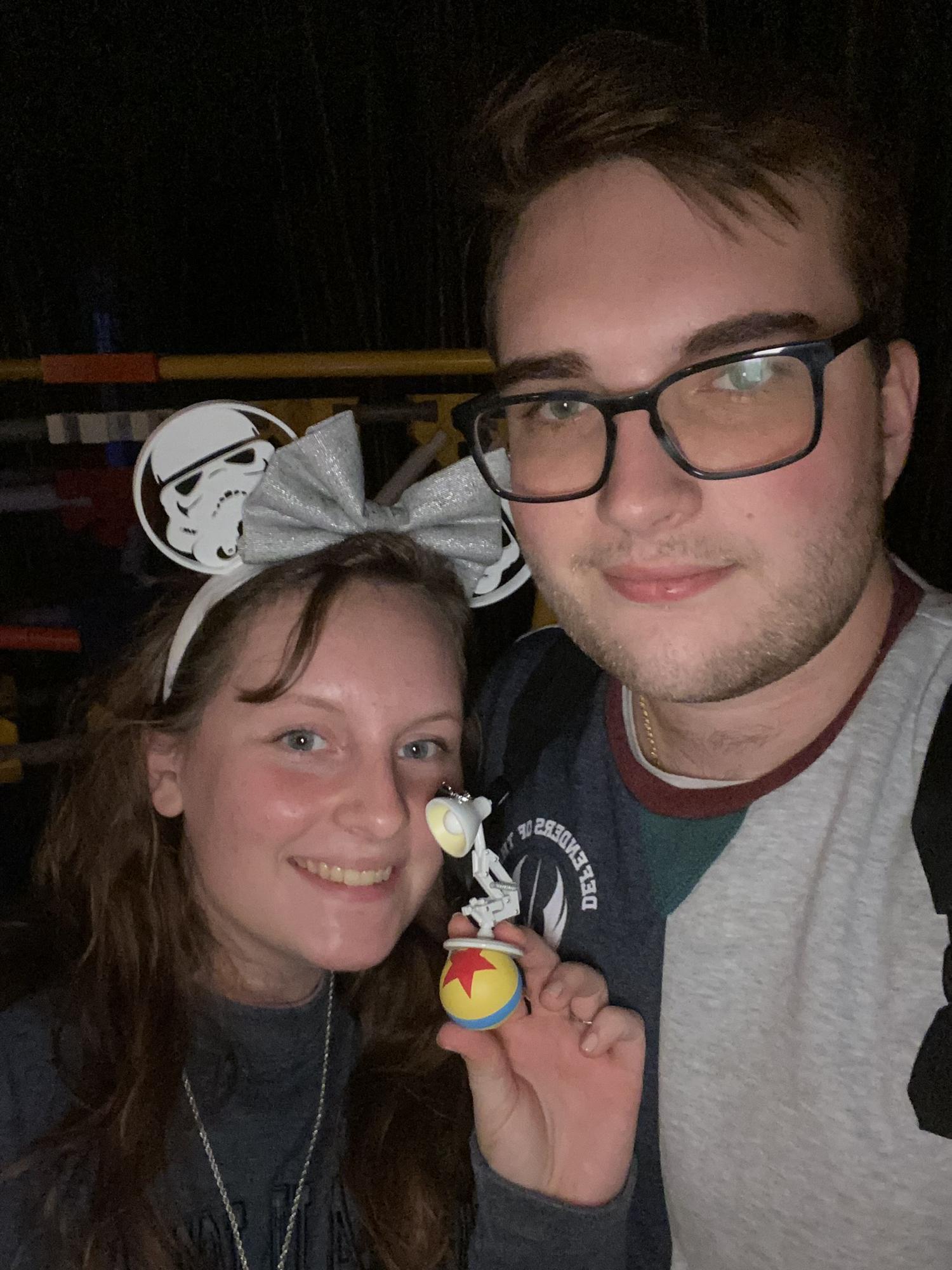 Jacob and Alianna with an ornament they bought in Disney in 2022.