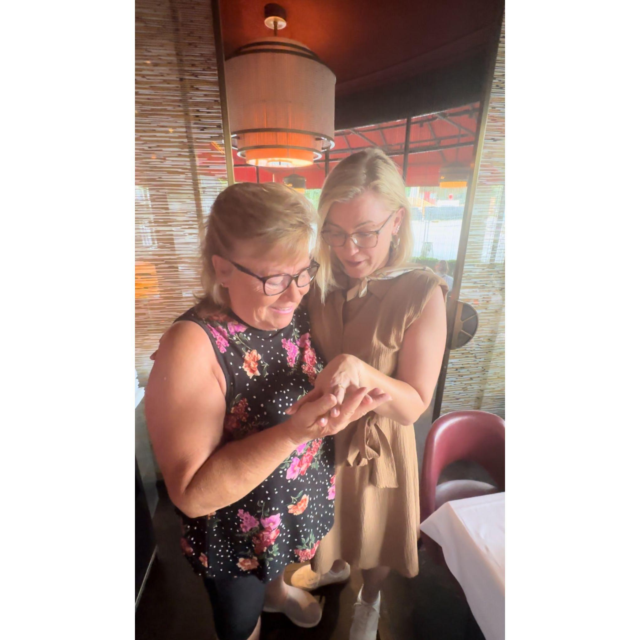 Mike and Cory's Mom Debi orchestrated for her to surprise Cor... right after the proposal in Paris!