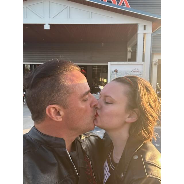 We enjoy riding together on John's Harley Davidson.