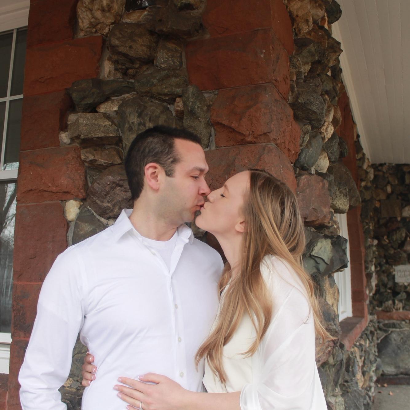 A sweet moment of Taylor and Mick in front of the historic Lansing Millis Station,