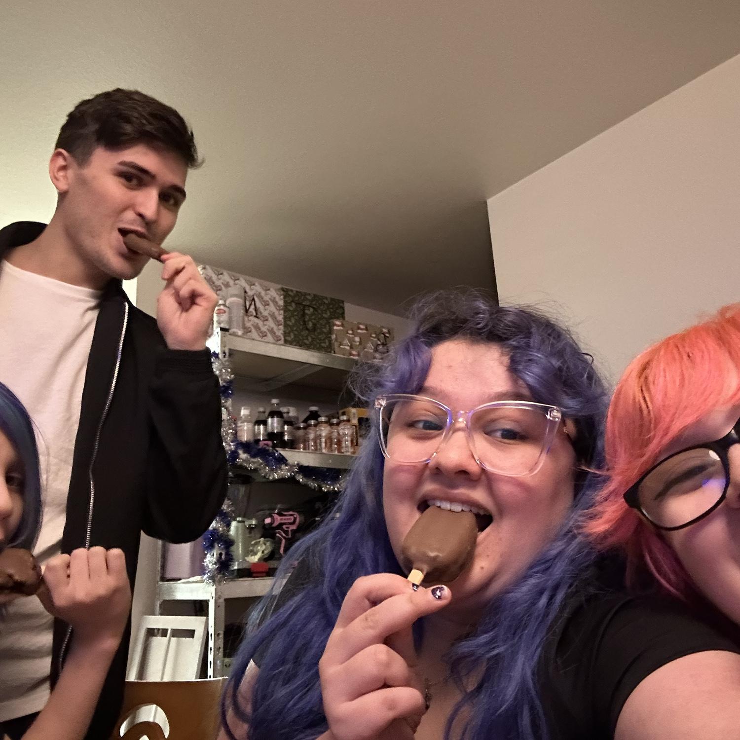 Joshua trying his first cake pop with the family
