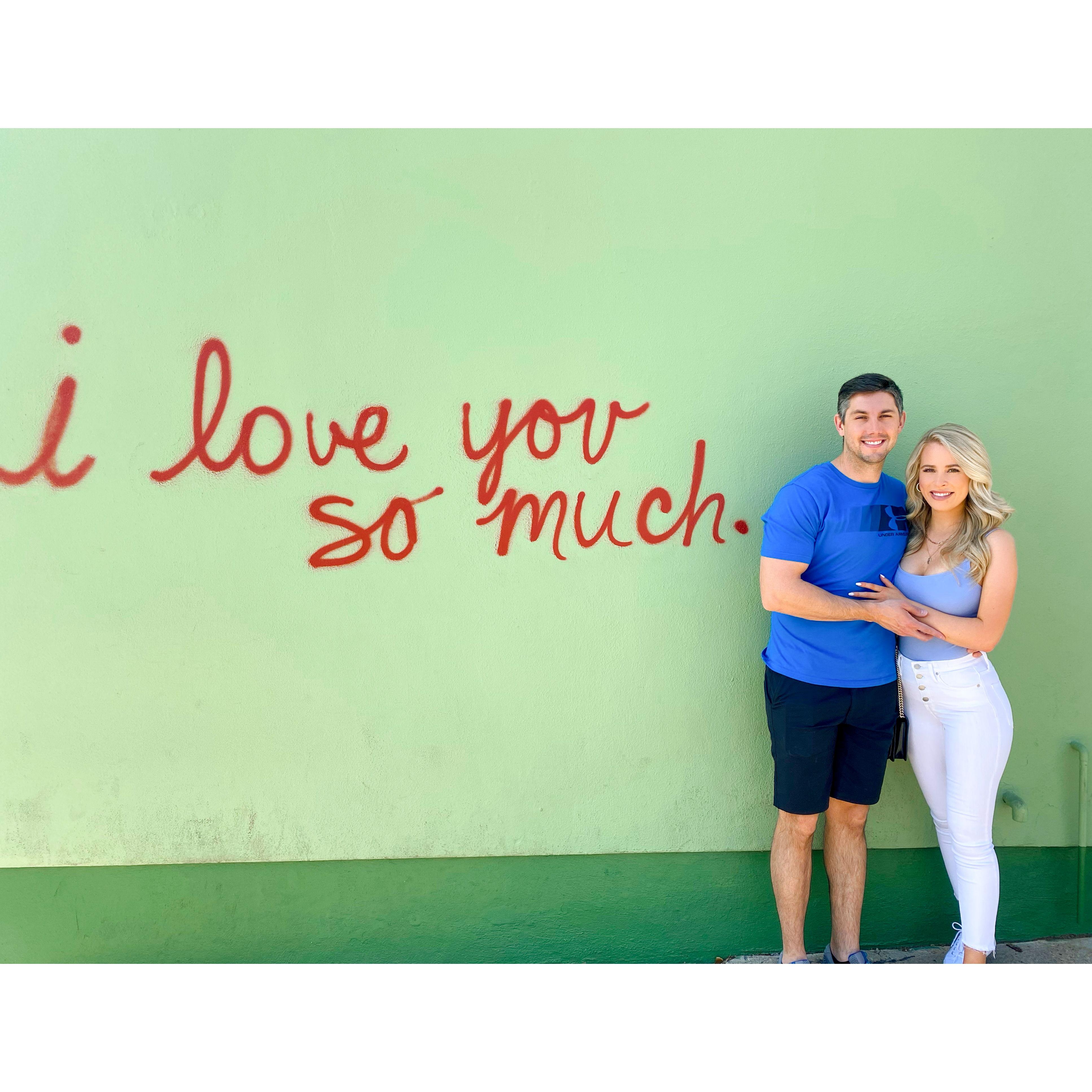 On Our Trip to Austin to see Mariah and Tyler! (Our Photographer Willie insisted we find this wall to take this picture!)