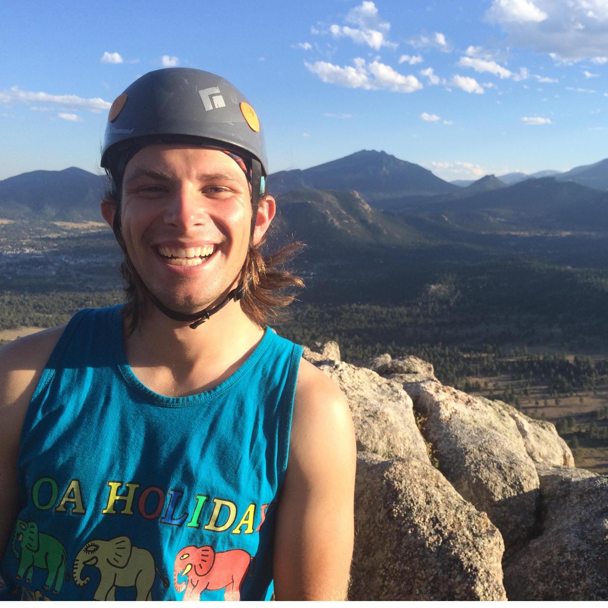 Mike topping out a climb in Estes Park, one of our first long climbs together