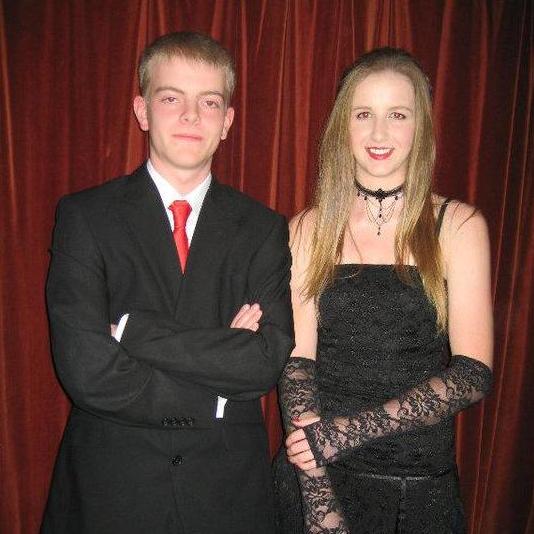 Attending the 2010 school ball together as "friends" - hence the awkward pose.